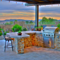 Designing Outdoor Kitchens with Granite, Stone, and Shelter in Mind